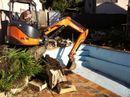 Digging out the old fibreglass pool